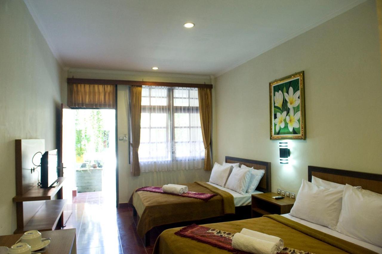 Catur Adi Putra Hotel Denpasar Habitación foto